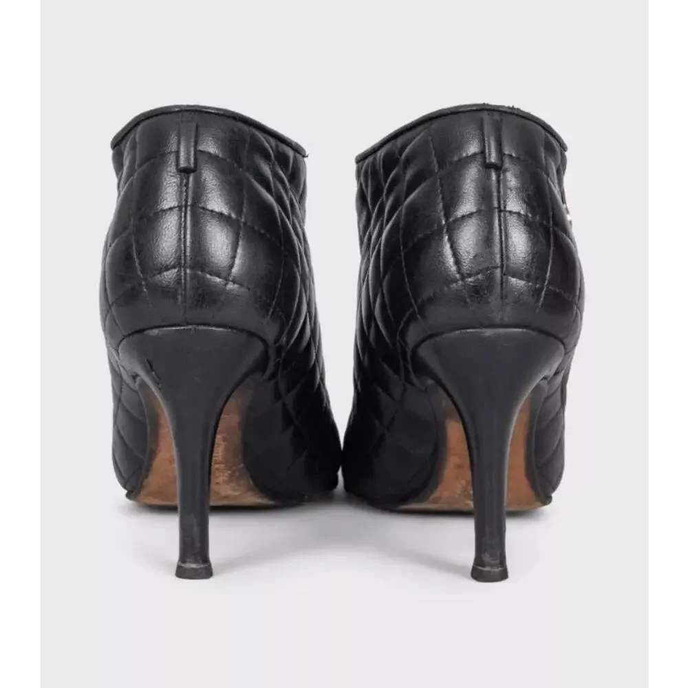 CHANEL Black Quilted Leather Zip Ankle Boots 37.5